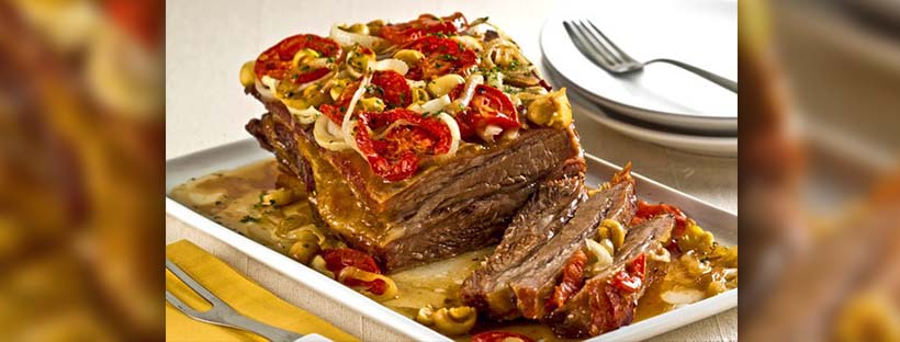 Costela assada com batata e tomate